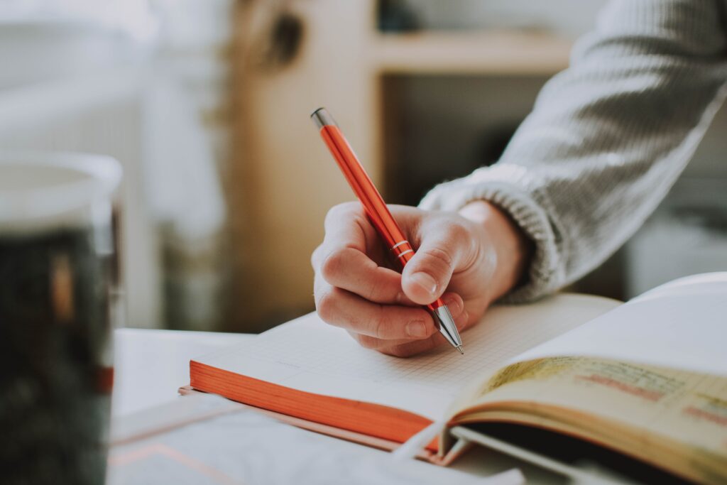 Podcaster writing the DNA of their podcast
